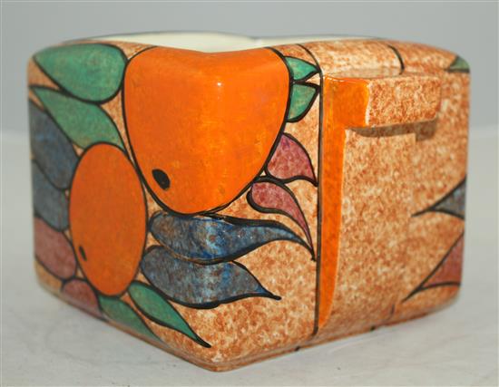 A Clarice Cliff Oranges pattern cafe au lait ground square biscuit barrel, shape 479, 18cm